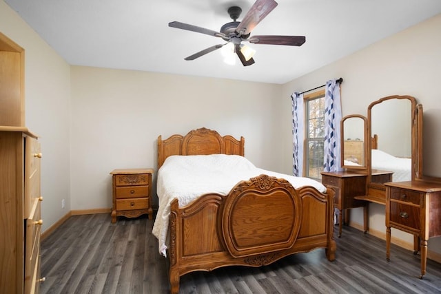 bedroom featuring baseboards, a ceiling fan, and wood finished floors