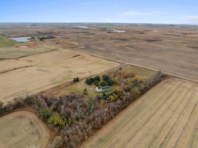 bird's eye view with a water view and a rural view