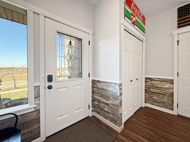 4005 Crossing St, Minot, ND 58701 - foyer entrance with a wainscoted wall and dark wood finished floors