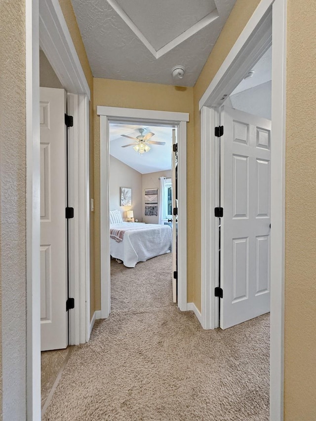 4005 Crossing St, Minot, ND 58701 - corridor featuring baseboards and carpet