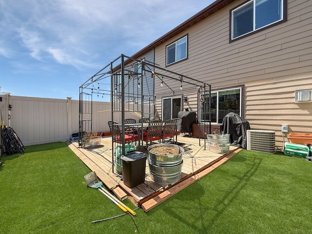 4005 Crossing St, Minot, ND 58701 - exterior space with a fenced backyard and central AC