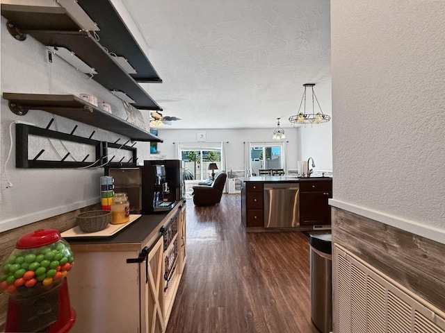 4005 Crossing St, Minot, ND 58701 - bar with a textured ceiling, stainless steel dishwasher, dark wood finished floors, a sink, and a textured wall