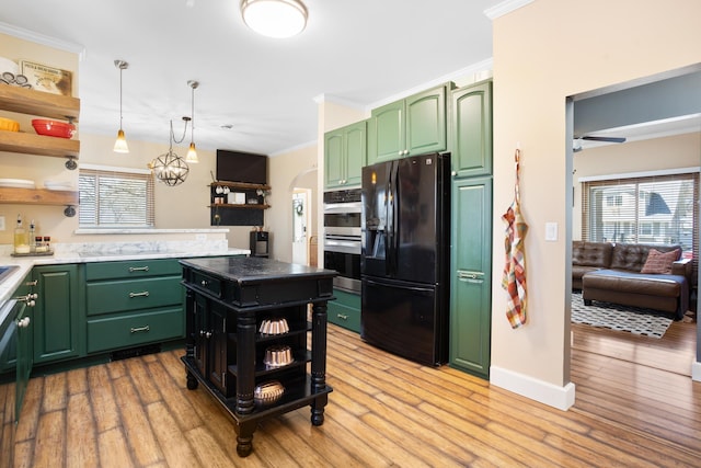 724 3rd Ave, Minot, ND 58703 - kitchen with black refrigerator with ice dispenser, stainless steel double oven, open shelves, crown molding, and green cabinetry