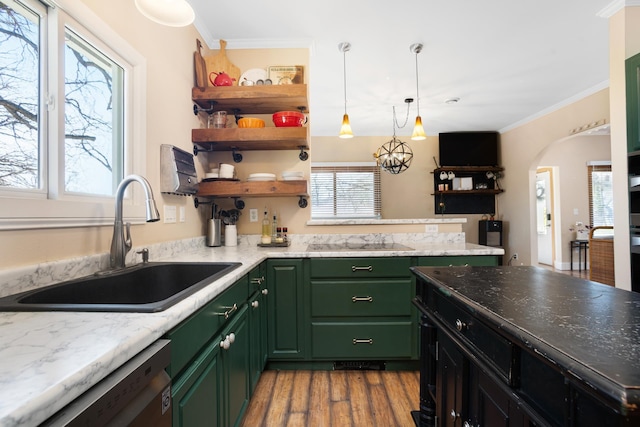724 3rd Ave, Minot, ND 58703 - kitchen with dishwasher, green cabinets, a sink, wood finished floors, and black electric cooktop