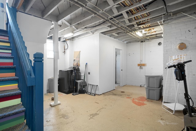 724 3rd Ave, Minot, ND 58703 - unfinished basement with washing machine and clothes dryer and stairway