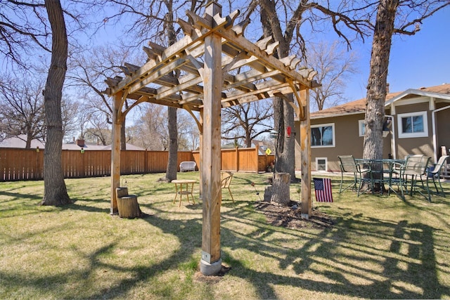 724 3rd Ave, Minot, ND 58703 - view of yard with a pergola and fence