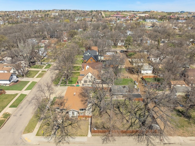724 3rd Ave, Minot, ND 58703 - birds eye view of property with a residential view