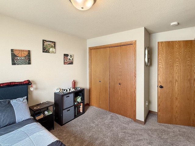 carpeted bedroom featuring a closet