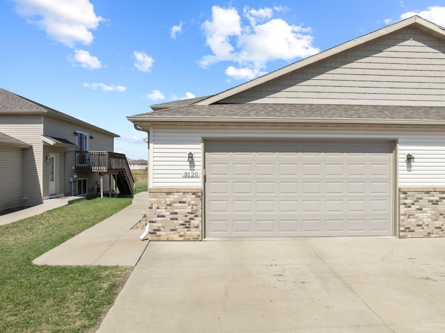garage featuring driveway