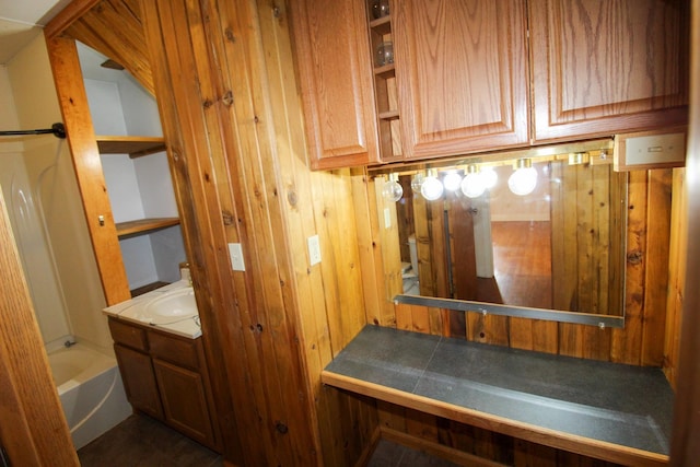 mudroom with wooden walls