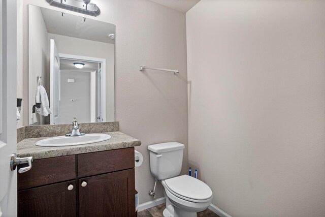 2344 NW 14th St, Minot, ND 58703 - bathroom featuring toilet and vanity