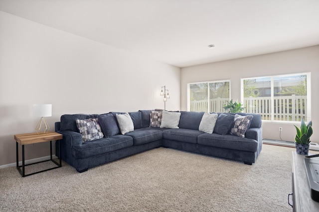 2344 NW 14th St, Minot, ND 58703 - living area with light carpet and baseboards