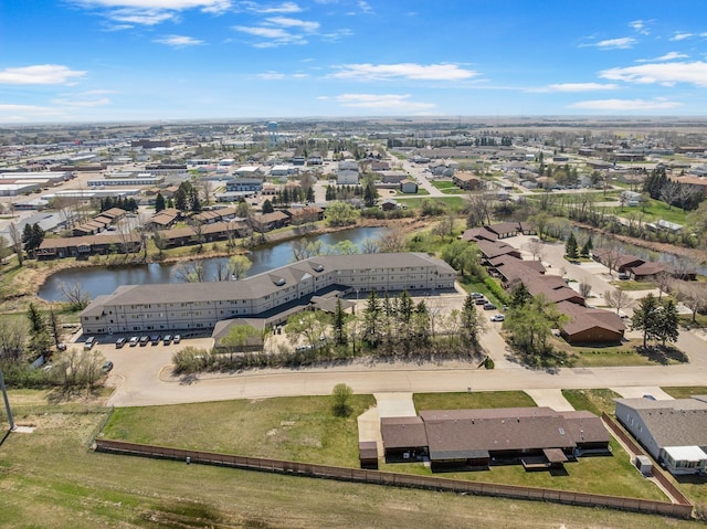 600 SW 24th Ave, Minot, ND 58701 - drone / aerial view with a water view and a residential view
