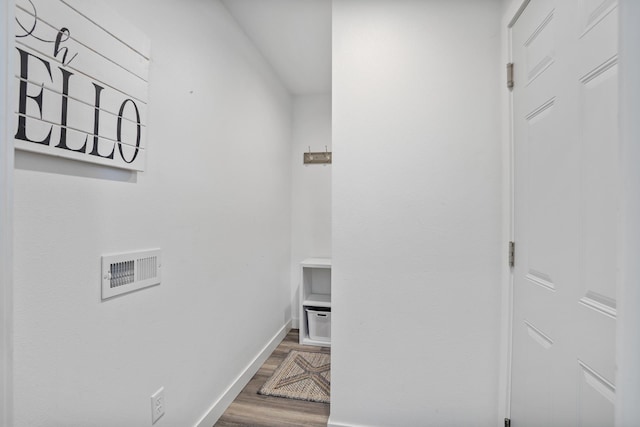 114 Mulberry Loop, Minot, ND 58703 - hall featuring wood finished floors and baseboards