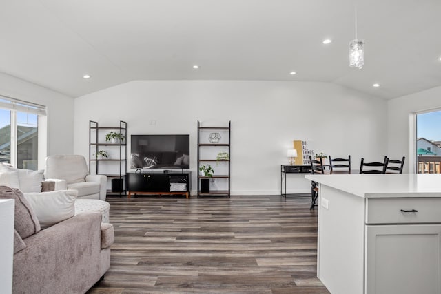 114 Mulberry Loop, Minot, ND 58703 - living room featuring vaulted ceiling, dark wood-style flooring, plenty of natural light, recessed lighting, and baseboards