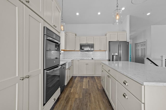 1504 Valley Bluffs Dr, Minot, ND 58701 - kitchen featuring black appliances, dark wood-style flooring, backsplash, hanging light fixtures, and white cabinetry