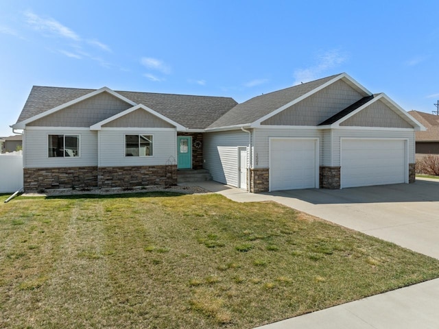 1504 Valley Bluffs Dr, Minot, ND 58701 - craftsman-style home featuring stone siding, a garage, concrete driveway, a front lawn, and a shingled roof