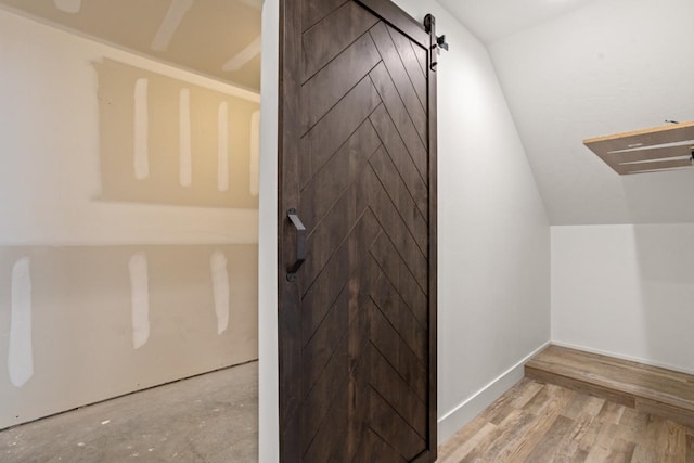 1504 Valley Bluffs Dr, Minot, ND 58701 - additional living space featuring a barn door
