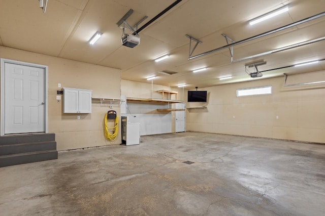 1504 Valley Bluffs Dr, Minot, ND 58701 - garage with a garage door opener
