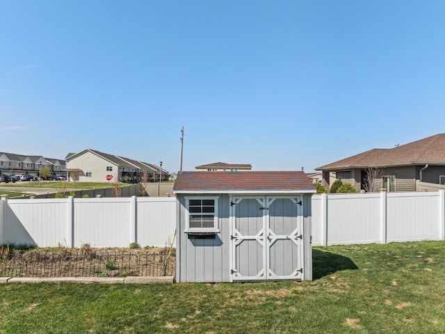 1504 Valley Bluffs Dr, Minot, ND 58701 - view of shed featuring a residential view