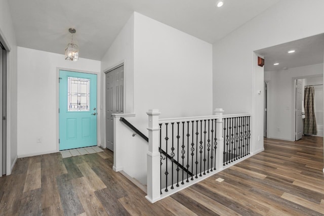 1504 Valley Bluffs Dr, Minot, ND 58701 - foyer featuring wood finished floors, recessed lighting, and baseboards