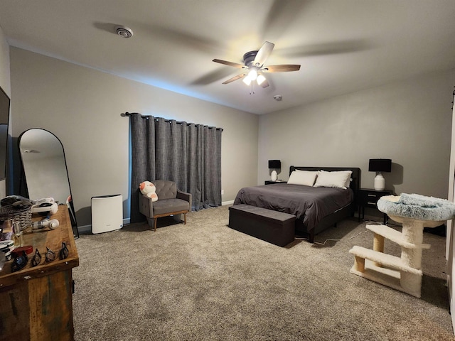 147 Mulberry Loop, Minot, ND 58703 - carpeted bedroom with a ceiling fan and baseboards