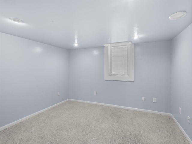 607 16th Ave, Minot, ND 58701 - carpeted spare room with baseboards