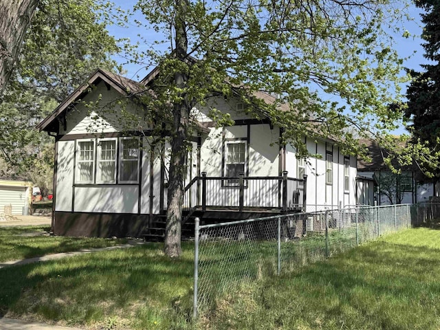 701 9th Ave, Minot, ND 58703 - view of front of property with a deck