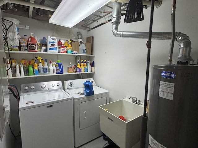 701 9th Ave, Minot, ND 58703 - clothes washing area featuring water heater and washer and dryer