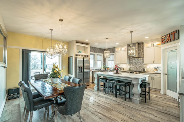 615 2nd St, Garrison, ND 58540 - dining room featuring a chandelier, light wood finished floors, and recessed lighting