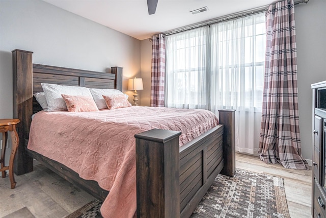 615 2nd St, Garrison, ND 58540 - bedroom with wood finished floors and a ceiling fan