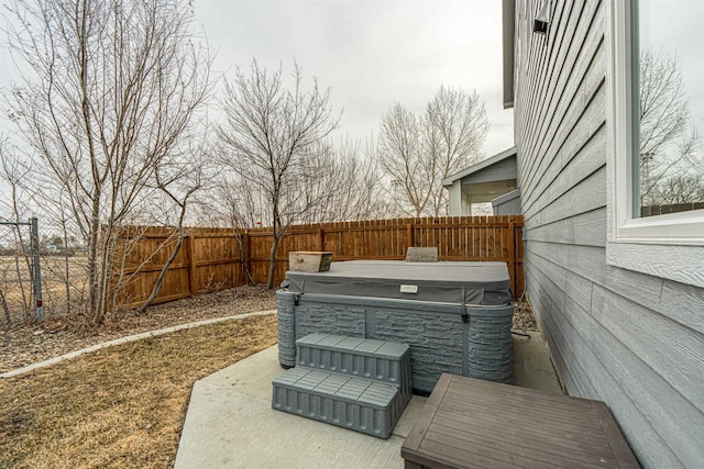 615 2nd St, Garrison, ND 58540 - deck with a hot tub and a fenced backyard