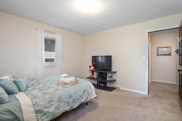 1001 20th St, Minot, ND 58703 - carpeted bedroom with baseboards
