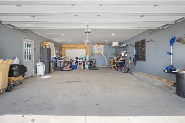 1001 20th St, Minot, ND 58703 - garage with freestanding refrigerator