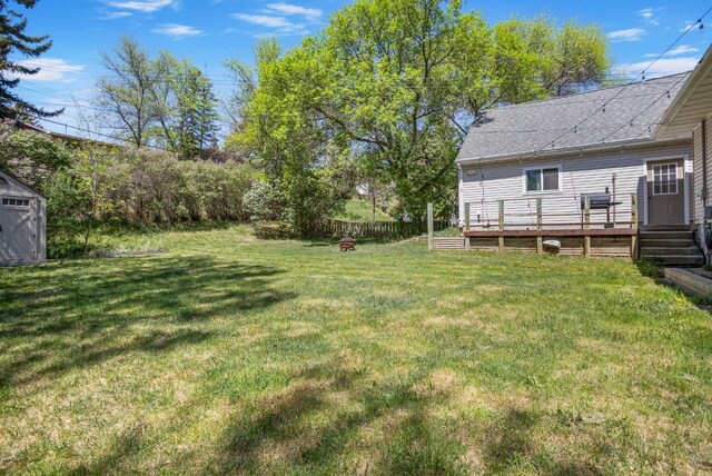 1001 20th St, Minot, ND 58703 - view of yard with a wooden deck