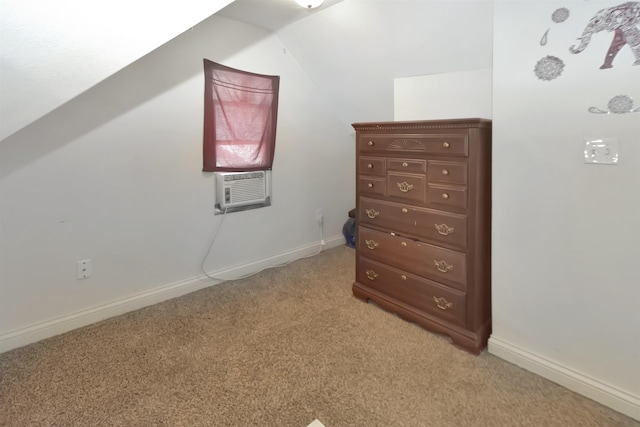321 6th St, Minot, ND 58703 - bonus room with light carpet, lofted ceiling, cooling unit, and baseboards