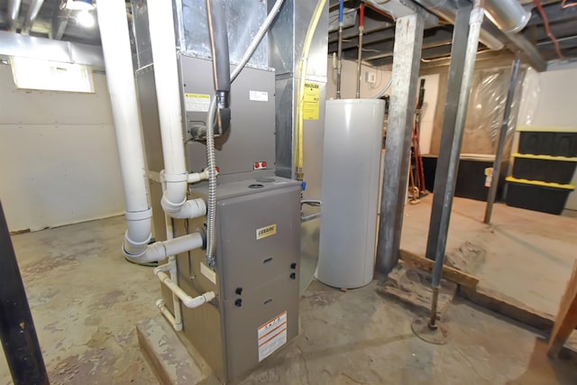 321 6th St, Minot, ND 58703 - utility room featuring water heater and heating unit