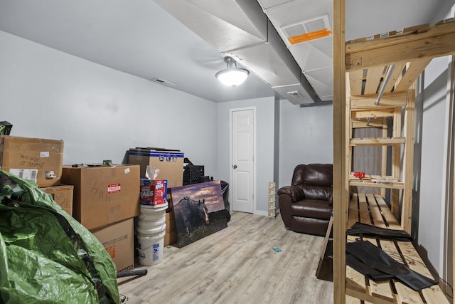 706 E Central Ave, Minot, ND 58701 - finished basement featuring wood finished floors