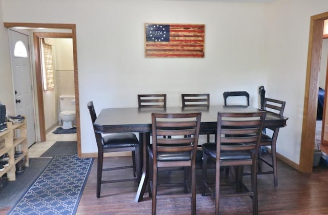 306 Davis St, Burlington, ND 58722 - dining area featuring wood finished floors and baseboards