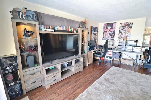 306 Davis St, Burlington, ND 58722 - living room featuring an office area, wood finished floors, and a textured ceiling