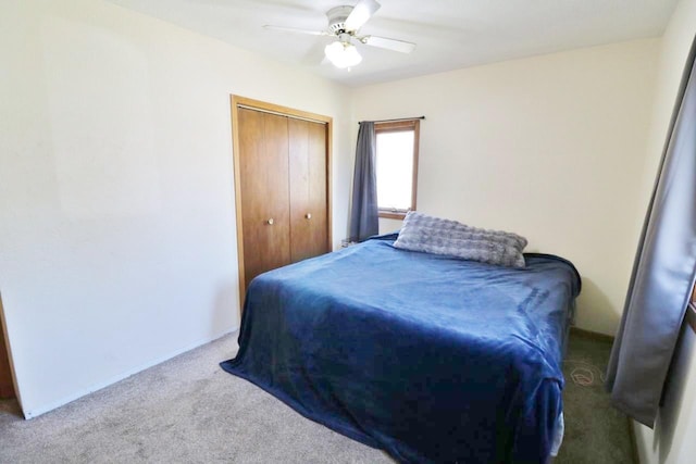 306 Davis St, Burlington, ND 58722 - bedroom with carpet flooring, a closet, ceiling fan, and baseboards