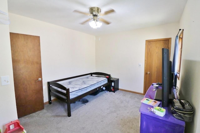 306 Davis St, Burlington, ND 58722 - carpeted bedroom with baseboards and a ceiling fan