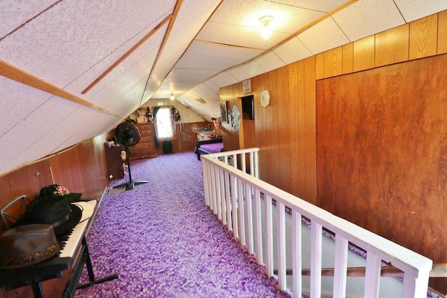 306 Davis St, Burlington, ND 58722 - additional living space featuring carpet flooring, wood walls, and vaulted ceiling