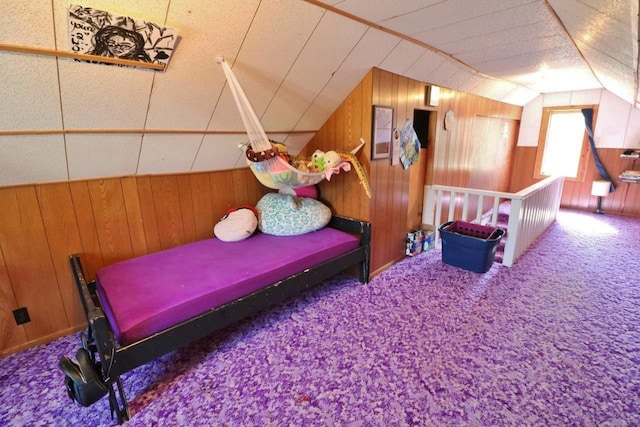 306 Davis St, Burlington, ND 58722 - bedroom with wooden walls, lofted ceiling, and carpet floors