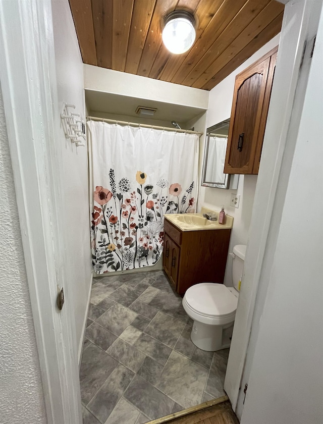 909 NW 10th Ave, Minot, ND 58703 - bathroom featuring toilet, wooden ceiling, vanity, and a shower with curtain
