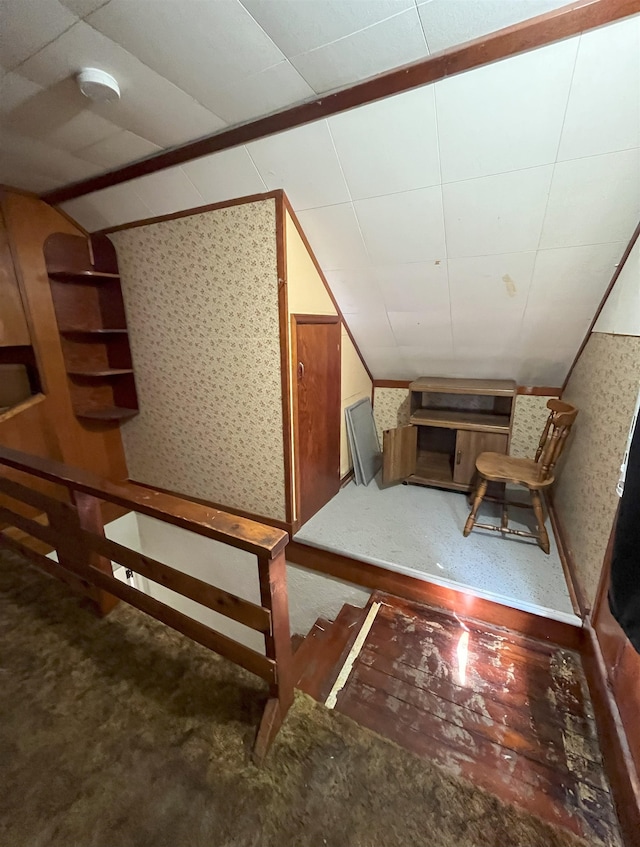 909 NW 10th Ave, Minot, ND 58703 - bonus room featuring vaulted ceiling and wallpapered walls