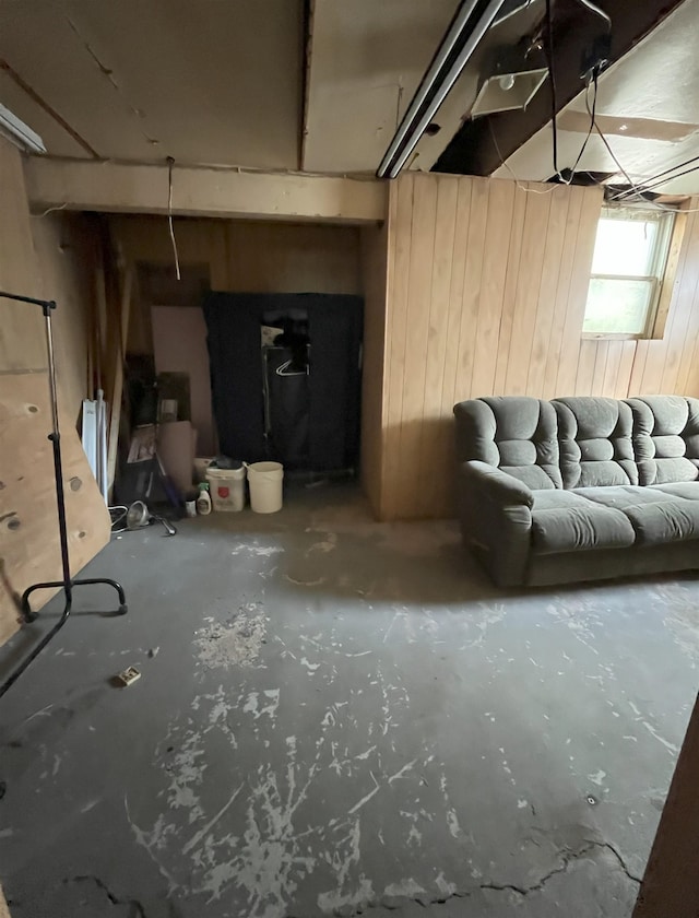 909 NW 10th Ave, Minot, ND 58703 - basement featuring wooden walls