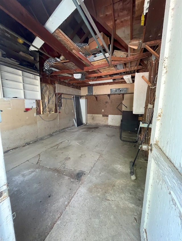909 NW 10th Ave, Minot, ND 58703 - miscellaneous room with a garage