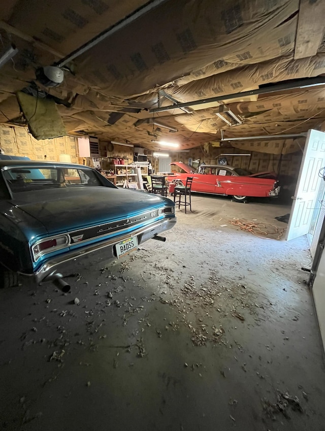909 NW 10th Ave, Minot, ND 58703 - garage with a garage door opener