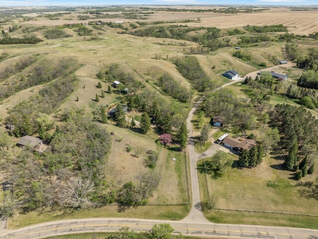 4401 38th St, Minot, ND 58701 - aerial view of property and surrounding area featuring rural landscape